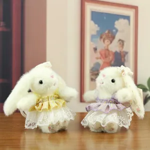 Cute bunny plush toy keychain with lace gauze skirt, fluffy rabbit bag pendant for gifts.