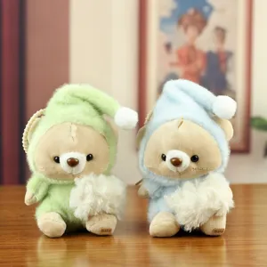 Cute plush bear keychain pendant with sleeping hat, soft stuffed animal doll bag charm.