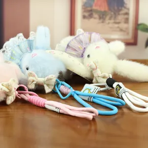 Cute bunny plush toy keychain with lace skirt, soft stuffed rabbit bag pendant and ornament.