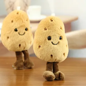 Cute potato plush toy pendant with dangling legs, soft stuffed vegetable doll keychain charm.
