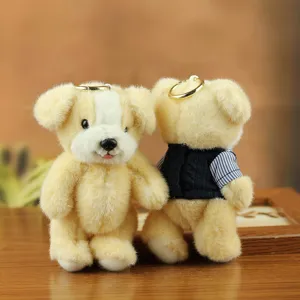 Lindo peluche de perrito llavero juguete con ropa y anillo de metal para bolso colgante.
