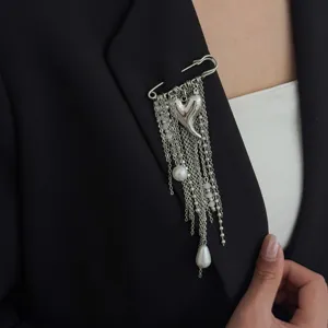 Punk style multi-chain safety pin brooch with heart and pearls for women fashion apparel accessories.