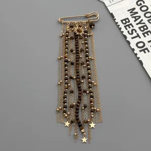 European and American retro multi-layer tassel safety pin brooch with beads and star charms.