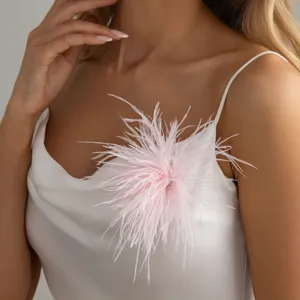 Elegant pink feather brooch pin detail shot for women fashion party dress accessory