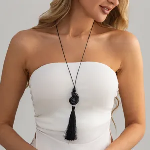 Long black resin shell pendant necklace with tassel and adjustable wax cord sweater chain