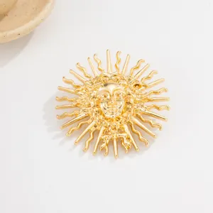 Vintage gold sun face brooch pin, elegant statement jewelry accessory for party and banquet events.