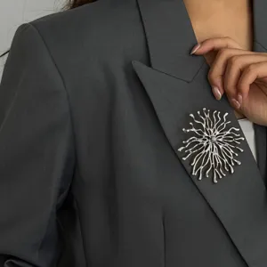 Exquisite silver irregular flower brooch detail shot, perfect for elegant party outfits.