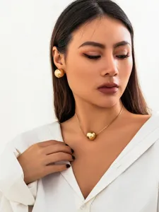 Gold sphere pendant snake chain necklace and stud earrings set for women chic jewelry.