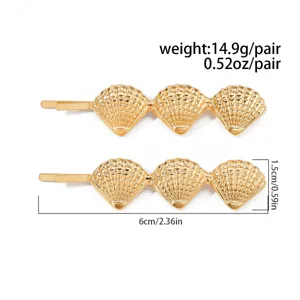 Gold shell hair clip detail view, alloy bobby pin set, beach style fashion hair accessories.