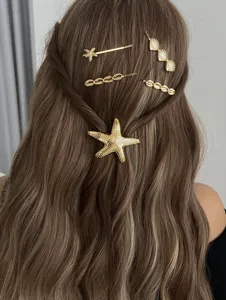 Gold starfish hair clip set ocean beach hair accessories for women elegant bobby pins styling.