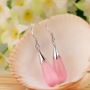 Elegant pink teardrop earrings with silver hooks, minimalist design for chic daily wear.