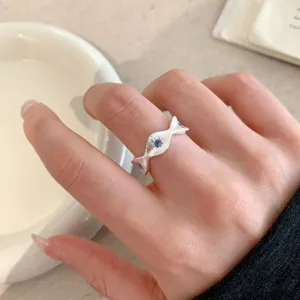 Silver geometric open ring for women, stylish niche design with blue stone inlay for daily wear.