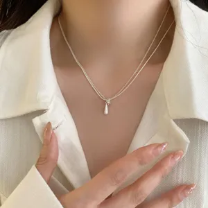 Exquisite double-layer teardrop necklace, minimalist silver clavicle chain for daily wear.