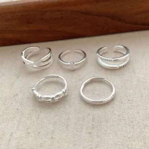 Silver open ring set, stackable minimalist geometric design for daily stylish wear.