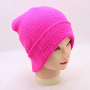 Fluorescent pink knitted beanie hat for men and women, stylish solid color winter warm cap.