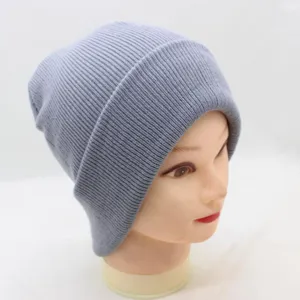 Grey ribbed knit beanie hat detail view, soft autumn winter warm wool skull cap for daily wear.