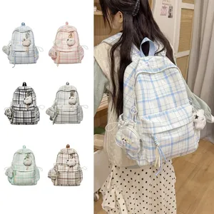 Korean style plaid student backpack with cute bear pendant and mini coin pouch for girls.