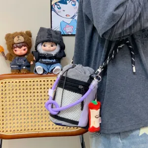 Outdoor functional crossbody bag detail, color-blocking water bottle holder, stylish wear.