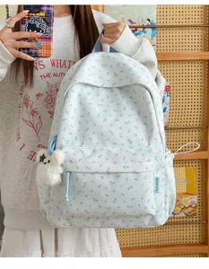 Sweet floral canvas backpack for women and students, perfect for school and casual daily travel.