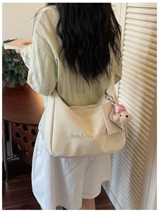 Sweet style creamy white shoulder bag with cute bear pendant and embroidery for women.