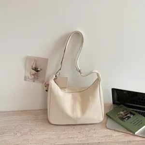 Minimalist solid color PU leather shoulder bag casual hobo tote bag for daily commuting women.