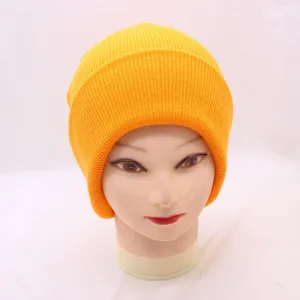 Vibrant fluorescent yellow knit beanie for men and women, stylish solid color winter warm slouchy cap.