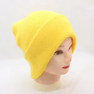 Neon yellow knitted beanie winter hat, soft warm ribbed cap detail for daily wear.