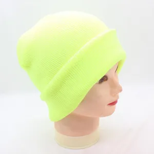 Neon yellow knitted beanie for men and women, solid color winter warm slouchy casual hat.