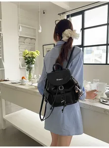 Detailed view of stylish black leather vintage backpack for women commuter school bag