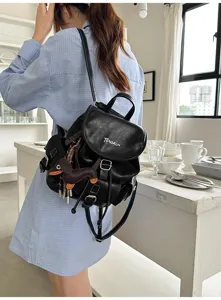 American vintage style women's backpack, black leather casual bookbag with cute keychain.