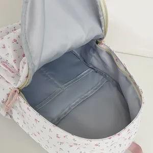Sweet floral backpack for women and students, stylish canvas daypack for school and travel.
