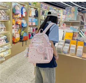 Pink star print casual backpack for teen girls cute school daypack with mini pouch