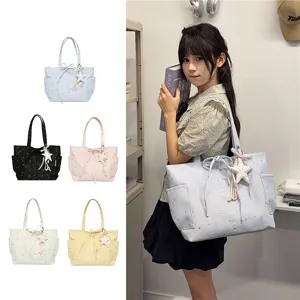 Women stylish casual tote bag with star pendant, versatile shoulder handbag for daily commute.