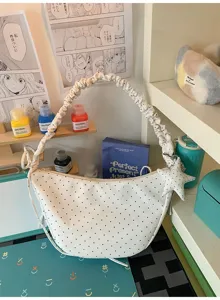 White polka dot crescent shoulder bag with gathered strap and cute star pendant for daily use.