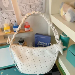 White polka dot hobo shoulder bag with scrunchie strap and star charm casual bag