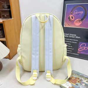 Casual minimalist milky yellow backpack for daily commute, lightweight and stylish student bag.