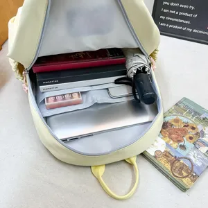 Milk yellow casual school backpack with large capacity, multi-compartment design for daily use.