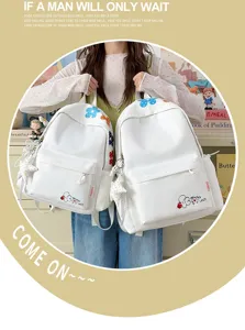 Casual white school backpack with colorful flower embroidery, lightweight student daypack.