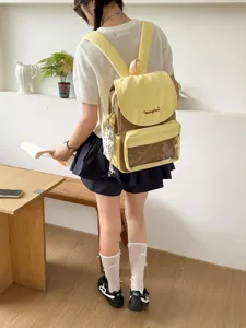 Yellow brown contrast color backpack detail view, sweet style casual daily school day bag.