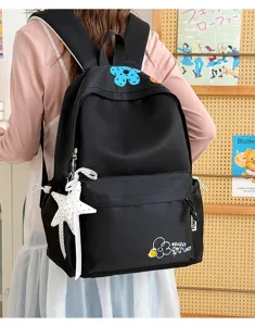 Black casual canvas backpack with cute flower embroidery, stylish star pendant and design.