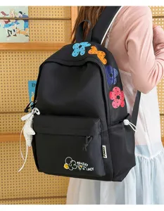 Casual black backpack with colorful floral embroidery, lightweight daily student school bag.