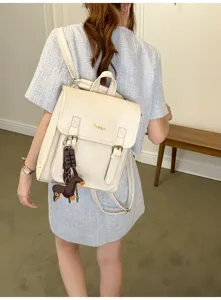 Casual minimalist leather backpack detail, stylish daily travel shoulder bag for women.