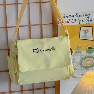 Cute canvas shoulder bag for women, Japanese style student messenger bag with cat embroidery.