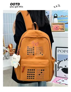 Stylish large capacity student school backpack with cute bear pendant and orange grid design.