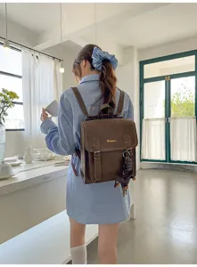Vintage brown leather backpack for women, casual school bookbag with spacious capacity stylish.