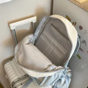 Casual canvas backpack with multi-compartment interior, perfect for daily travel and school use.