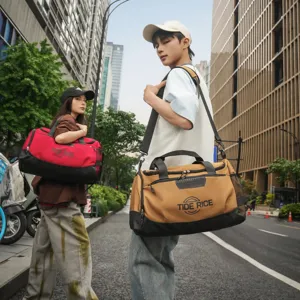 Grand sac de sport et de voyage pour homme et femme, idéal pour le fitness et l'entraînement.