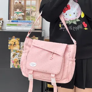 Rosa Canvas Umhängetasche mit Sternenmuster für Schule und Pendeln, stilvolle Schultertasche.