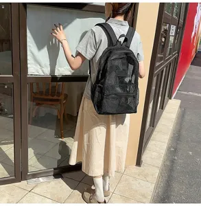 Sac à dos en filet noir décontracté pour étudiants, grande capacité, cartable quotidien.