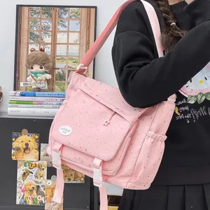 Rosa Canvas Umhängetasche Detail, süße Sternen Print Schultasche mit praktischen Schnallen.